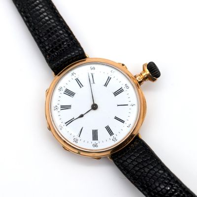 an image of a close up of a wrist watch with roman numerals