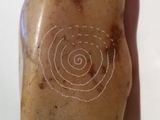 a picture of a stone with a drawing on it