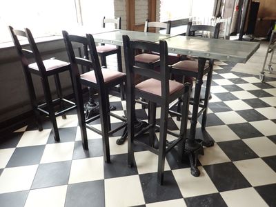 a black and white checkered floor in a restaurant