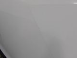 the front of a white car with the hood down