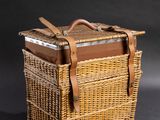 wicker picnic basket with leather straps and leather lining