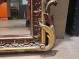 a picture of a mirror that is on the floor