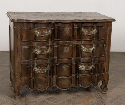 an antique chest of drawers with a marble top on a herringle floor