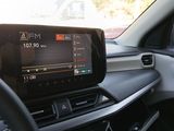 a picture of a car dashboard with a display on it