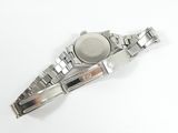 a watch that is laying on a white surface