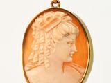 an image of a picture of a woman in a gold necklace