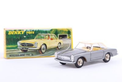 an image of a toy car and a box of dinky toys