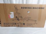 a cardboard box with a drawing of a rowing machine on it