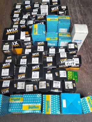 several boxes of various types of boxes are stacked on top of each other