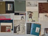a table with many books and pamphlets on it