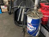 a bucket and a can of pepsi sitting on a cart in a warehouse