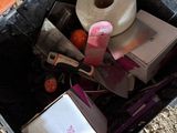 a box full of items that are sitting on the ground