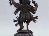a bronze statue of the hindu god ganesh