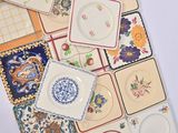 a lot of plates that are sitting on a table