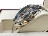 a watch that is sitting in a box on the table
