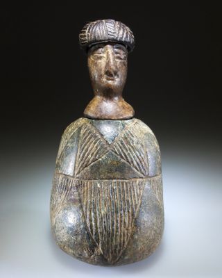 an image of a statue of a man with a hat on his head