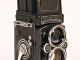 an old photo of an old camera on a white background