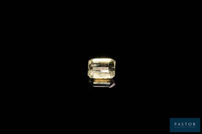 a yellow diamond on a black background