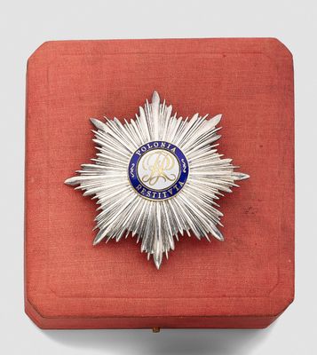 an image of a red box with a silver star on top of it