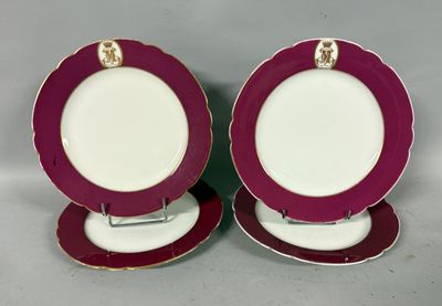 pair of purple and white plates with gold trims on them