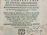 a close up of a book with writing on it on a table