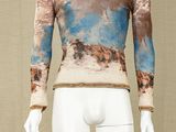 a mannequin with a blue and brown design on it