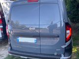 a van that is parked on the side of the road