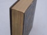 a small book that is sitting on a table