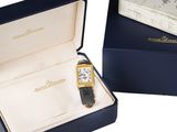 a box with a watch inside of it and a box with a watch inside of it