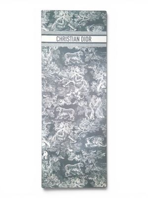 a close up of a book on a white surface with a black and white background