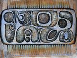 a close up of a plate with a design on it