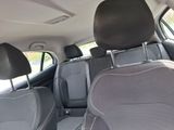 the back seats of a car with two rows of seats in it