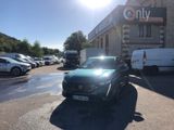 a car parked in front of a building in a parking lot