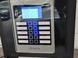 a coffee machine that is sitting on a table