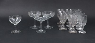a lot of empty wine glasses on the table