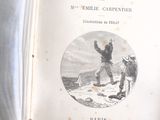 un vieux livre avec l'image d'un homme et d'un chien
