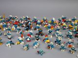 a lot of small figurines that are on the table