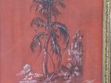 painting of a palm tree in a gold frame on a red background
