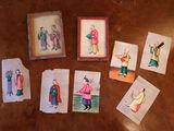 de nombreuses cartes sur lesquelles figurent des photos de personnes