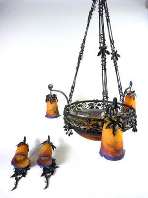 a chandelier that has a bunch of candles on it