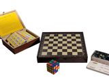 a box that has a chess board and some cards in it