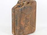 an old rusty metal canister with no lid on a white background
