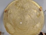 a glass bowl that is sitting on a table