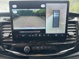 a picture of a car dashboard with a camera on it