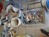 a picture of a dirty kitchen floor with a lot of clutter on it