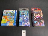 three pokemon trading cards are sitting next to each other on a table