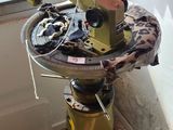 a machine that is sitting on the floor next to a window