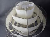 a large white ship that is on display in a glass case