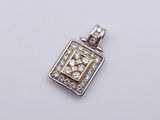 an image of a diamond pendant on a white surface