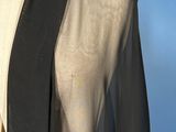 a black and white jacket on a mannequin mannequin mannequin mannequin mannequin mannequin mannequin mannequin mann